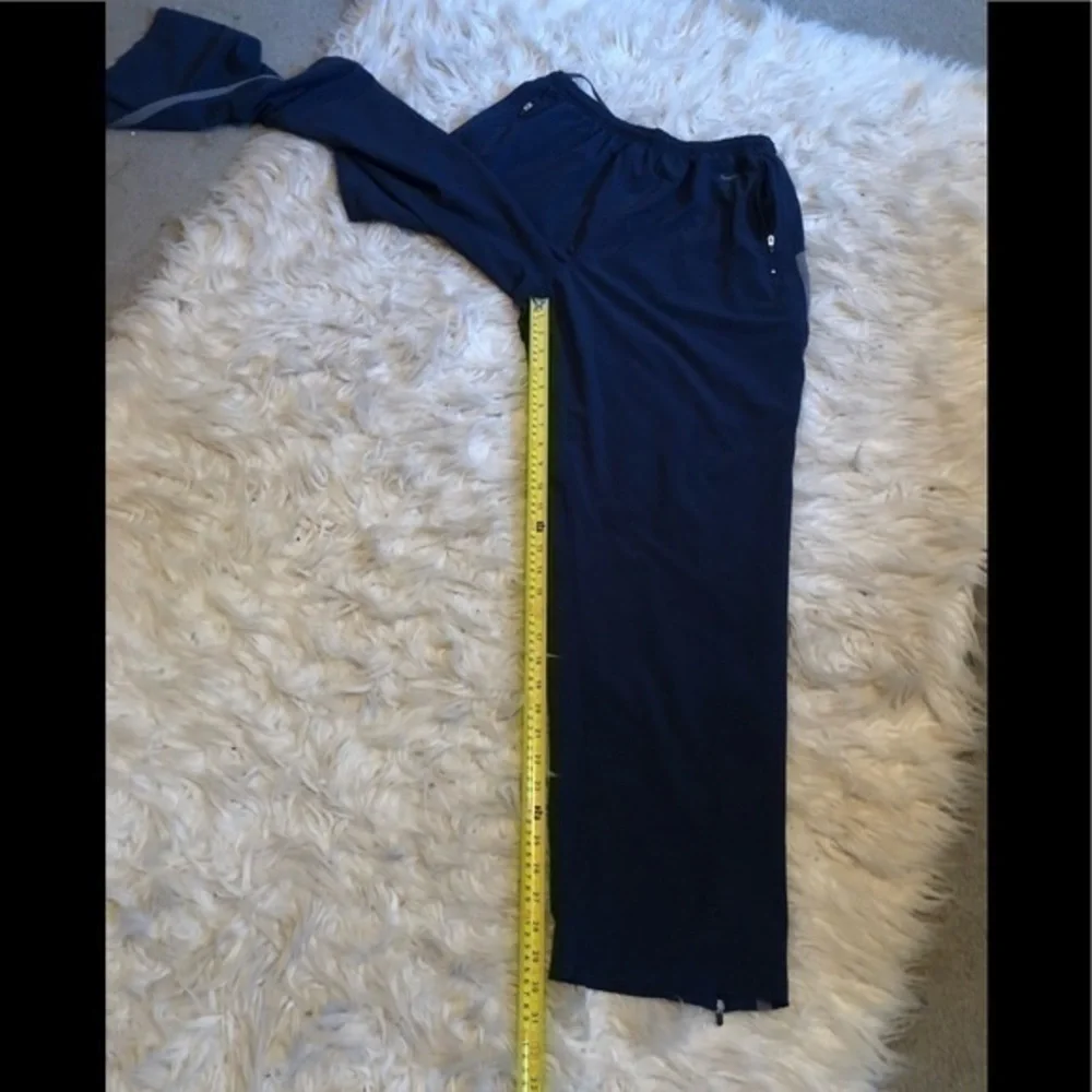 Nike dri-fit black side zipper pocket mesh side panel sz lg